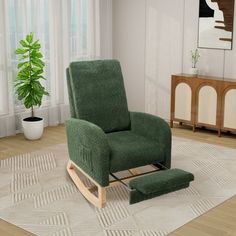 a living room with a rocking chair and rug on the floor next to a potted plant