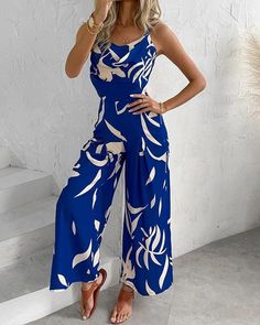 Step into summer with this elegant and versatile Spaghetti Strap Wide Leg Jumpsuit! Crafted for both style and comfort, this fashion-forward piece features a high waist and flowing wide legs. The lightweight fabric keeps you cool during warm days, while the adjustable spaghetti straps add a touch of femininity. Whether you're strolling on the beach or attending a garden party, this jumpsuit effortlessly combines casual and chic. Jumpsuits Womens Fashion, Women Vacation, Fitted Jumpsuit, Backless Jumpsuit, Chic Type, Long Sleeve Maxi, Botanical Print, Wide Leg Jumpsuit, Summer Outfits Women