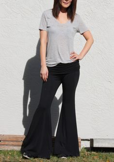 "Comfy and easy black wide leg pants you can wear more than lounging and exercise Fold over waist with side draw strings Fitted over knees and flares beautifully at the bottom Wear it around town for easy walk or shopping at farmers market -Fits like glove -Wide bottom -Double layered waist panel goes under the chest. It can be worn as a maternity pants in this way. -Draw Strings attached on both waist sides to create shirring when they are pulled -Waist sits below naval when the double layered Bohemian Black Pants, Black Stretch Bohemian Bottoms, Bohemian Black Stretch Bottoms, Black Wide-leg Yoga Pants, Black Stretch Bohemian Harem Pants, Stretch Maternity Pants Casual Style, Casual Maternity Stretch Pants, Casual Maternity Bottoms For Summer, Casual Summer Maternity Bottoms