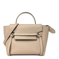 This is an authentic CELINE Grained Calfskin Micro Belt Bag in Light Taupe.This handbag is crafted of grained calfskin leather in beige with a structured and spacious silhouette. This shoulder bag features a leather top handle strap, an optional adjustable shoulder strap, and polished brass clasps. The facing flap opens to a matching suede interior. Timeless Beige Calf Leather Satchel, Beige Calf Leather Satchel With Detachable Handle, Beige Calf Leather Satchel With Top Handle, Beige Textured Leather Top Handle Satchel, Luxury Beige Pebbled Leather Shoulder Bag, Luxury Neutral Top Handle Shoulder Bag, Beige Calf Leather Satchel With Handle Drop, Beige Pebbled Leather Satchel With Double Handle, Luxury Taupe Calf Leather Shoulder Bag