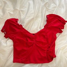 Ruffled Top, Brand New Without Tags But Has Never Been Worn, In Great/New Condition And Fits Size Small But Is Stretchy! Trendy Red Top With Ruffles, Trendy Red Ruffled Blouse, Red Stretch Ruffle Tops, Red Ruffled Stretch Tops, Flirty Red Top With Ruffles, Fitted Ruched Red Blouse, Chic Red Top With Ruffle Hem, Ruffled Top, Red Top