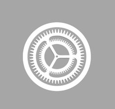 a white clock with gears in the middle