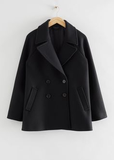 Double-breasted long-sleeve wool pea coat with buttoned closure and duo slanted welt pockets in a short silhouette. Four button closureHeavy stitchingLength of coat: 73cm / 28.7" (EU 36 / UK 10 / US 4) Wool Pea Coat, Black Wool Coat, Wool Peacoat, Women's Jackets, Pea Coat, Fashion Story, Black Wool, Black Coat, Wool Coat