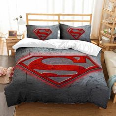 a bed with a superman symbol on it