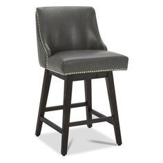 an upholstered bar stool with studding on the back