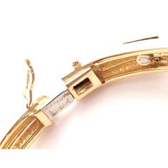 Vintage Tiffany & Co. 18k Yellow Gold Diamond Bangle Bracelet  Metal: Tiffany Box + Pouch Included   Metal: 18k Yellow Gold Measurements:  Length: 6.5"  Width: 7mm Weight: 24.6 grams Stones: 16 brilliant round cut diamond VS1 clarity, E color total weight approximately 1.12ct Hallmarks: Tiffany 18k  Please reference the dimensions in the description for the best approximate dimensions. Tiffany Box, Diamond Bangle Bracelet, Box Pouch, Vintage Tiffany, Bracelet Metal, Diamond Bangles Bracelet, Diamond Bangle, Metal Bracelets, Round Cut Diamond