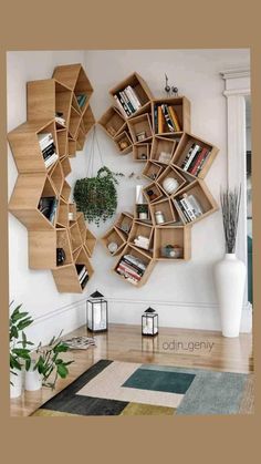 a living room filled with furniture and bookshelves on the wall above a coffee table