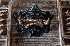 Discover the ultimate Japanese Golden Drangon mask, expertly 3D printed for high-quality detail. Each piece is handmade and hand-painted, showcasing intricate designs inspired by traditional artistry. Perfect for cosplay, festivals, or as a unique art piece, this mask blends modern technology with classic craftsmanship. Elevate your collection with this stunning, one-of-a-kind creation! Comes in 2 Options : Wearable ( comes with elastic band )                                        Decorative ( Samurai Mask, Cloth Mask, Gold Dragon, Half Face, Intricate Designs, Modern Technology, In 3d, 3d Printed, Costume Accessories