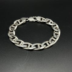 "Authentic vintage Italian sterling silver chain link bracelet.  This vintage chain and link bracelet is made in Italy! Made entirely of 925 sterling silver.  Stamped with \"Italy\" and \"925\" on the sterling near the clasp. Artist: Unknown, unsigned.  Condition: great! Some signs of use and aging but no signs of damage or restorations. Made in Italy. Authentic Italian silver.  Measurements: 1/4 inches wide. 8 1/2 inches long fits size 7, 8 wrists." Sterling Silver Curb Chain Bracelet With Oval Links, Classic Sterling Silver Chunky Chain Bracelet, Classic Sterling Silver Bracelet With Chunky Oval Links, Classic Sterling Silver Bracelet With Chunky Chain, Classic Silver Chain Link Bracelet, Silver Oval Link Curb Chain Bracelet, Silver Curb Chain Bracelet With Oval Link, Classic Sterling Silver Chain Link Bracelet, Silver Bracelets With Rectangular Curb Chain Links