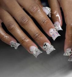 Silver And White Nails Short, Short White Nails With Charms, White Nails Charms, Silver Junk Nails, White Gem Nails, Silver Nail Ideas For Prom, White Medium Nails, Milky White Nails With Rhinestones, White Junk Nails