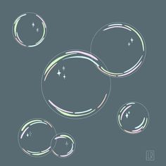 three soap bubbles floating in the air on a black background with white and green lines