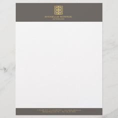 a white and gray stationery with gold accents