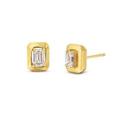 These Emerald Gold Frame Solitaire Stud Earrings feature emerald cut diamonds totaling approximately 0.43 carats framed in 18K yellow gold. Luxury Yellow Gold Emerald Cut Diamond Earrings, Emerald Cut Diamond Earrings In Yellow Gold, Gold Baguette Cut Diamond Earrings With Vvs Clarity, Elegant Yellow Gold Emerald-cut Diamond Earrings, Luxury Gold Emerald Cut Diamond Earrings, Luxury Gold Emerald-cut Diamond Earrings, Gold Diamond Octagon Earrings, Gold Emerald Cut Diamond Earrings, Formal Yellow Gold Emerald Cut Diamond Earrings