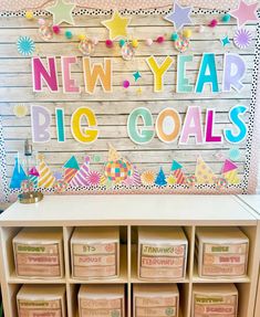 the new year's big goals display is displayed in front of a wooden wall