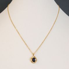 Delicate Gold Chain With Spring Ring Closure Faceted, Oval Simulated Sapphire Believable Size And Beautiful Color Gold Prong Setting Stamped On Back With 14k Ge Bc -Lind 18" Length Stone Width 1/4" Stone Length 3/8" Setting Diameter 1/2" Never Worn. No Flaws Noted. Excellent Condition. Elegant Sapphire Color Gold-plated Necklace, Elegant Sapphire Color Gold Plated Necklace, Elegant Blue Necklace With Gold Chain, Elegant Blue Jewelry With Gold Chain, Serotonin Necklace, Silver Feather Necklace, Sapphire Pendant Necklace, Ceramic Beads Necklace, Mickey Mouse Necklace