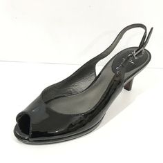 NEW IN THE BOX!  US SIZE 6.5 - medium width Patent leather upper Slingback with adjustable buckle closure Lightly padded leather footbed 0.25 " platform 2 1/4 " stack heel Leather & rubber outsole US size 6.5 Medium width Color : Black Retail is $178 Slingback Pump, Stacked Heel, Cole Haan, Sling Backs, Women's Pumps, Shoes Women Heels, Patent Leather, Open Toe, Leather Upper