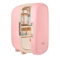 The Cooluli Beauty 12L Mini Fridge is a must-have for beauty and skincare products. It efficiently cools serums, creams, sheet masks, and more to a soothing and steady 50°F, preserving and protecting in a compact and elegant design. Skin Care Fridge With Drawer, Best Beauty Fridge, Skincare Fridge Products, Frigidaire Mini Fridge Baby Pink, Preppy Makeup Fridge, Cheap Skincare Mini Fridges, Large Skincare Fridge, Pink Beauty Fridge, Skincare Mini Fridge Aesthetic