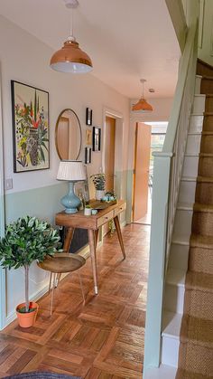 the hallway is clean and ready to be used as a place for art or decorations