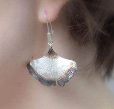 Wonderful, delicate silver earrings in the shape of ginkgo leaves. Covered with brown oxide at the ends of the leaves. Earrings length 5 cm, width 3.8 cm. 925 silver fineness. Leaves Earrings, Ginkgo Leaves, Ginkgo Biloba, Ginkgo Leaf, Favorite Jewelry, Jewelry Earrings Dangle, Poland, Silver Earrings, 925 Silver