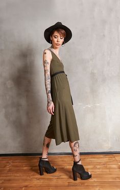 The perfect summer boho jumpsuit is here! Wide-leg pants, dripping around your figure like a waterfall and a looser style that will allow you to go anywhere in this beauty and feel comfortable. Its unique backless design will give you a chic and edgy look and you can adjust the fit at the waist with the subtle belt. It's a must-have for the new season! Be Love ♥♥ ♥ Material: Jarsey 90% viscose, 10% elastane ♥ Care Hand Wash / Dry Cleaning Machine 30oC / 104oF Max Do Not Tumble Dry Do Not Bleach Bohemian Sleeveless Jumpsuits And Rompers For Party, Bohemian Sleeveless Jumpsuits For Party, Bohemian Sleeveless Party Jumpsuits And Rompers, Bohemian Sleeveless Party Jumpsuit, Summer Party Jumpsuits And Rompers With Tie Waist, Summer Beachwear Stretch Jumpsuits And Rompers, Summer Beach Stretch Jumpsuits And Rompers, Summer Stretch Beachwear Jumpsuits And Rompers, Summer Beach Jumpsuits And Rompers With Stretch