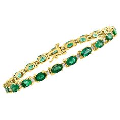 This exceptionally affordable Tennis bracelet has 21 stones of oval Emeralds . Each Emerald is spaced by a tiny diamond . Total weight of Emerald is approximately 8.0 carat. Size of emerald is 4x6 MM The bracelet is expertly crafted with 12.0 grams of 14 karat gold . Have a safety clasp. 7 inch long. Brilliant cut diamonds Very reasonable price for this bracelet Special promotional price Its very hard to capture the true color and luster of the stone, I have tried to add pictures which are taken Luxury Oval Tennis Bracelet With Diamond Accents, Luxury Oval Diamond Bracelet With Prong Setting, Luxury Oval Bracelets With Diamond Accents, Luxury Oval Bracelets With Prong Setting, Fine Jewelry Oval Diamond Bracelet With Accents, Luxury Oval Diamond Bracelet For Anniversary, Oval Diamond Bracelet With Accents, Oval Diamond Bracelet With Diamond Accents, Luxury Green Oval Bracelet