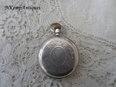 Antique silver pocket watch 1900 6cm please note all my watches are sold as not working Silver Locket Watch For Formal Occasions, Antique Engraved Silver Pocket Watch, Vintage Silver Locket Watch, Timeless Silver Pocket Watch With Stopwatch Feature, Silver Timeless Pocket Watch With Stopwatch, Silver Pocket Watch With Locket For Formal Occasions, Timeless Silver Pocket Watch With Locket, Formal Silver Pocket Watch With Locket, Formal Silver Locket Pocket Watch