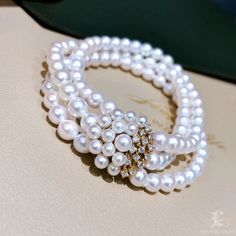 Highlight: Classic Double Strand Bracelet Product Information OriginJapan MaterialAkoya Pearl, 18k Gold, and Diamond DimensionsLength Approx. 17.5 cm Pearl Shaped: Round Size: 6-7 mm Quality: AAA Nacre: Very Thick Color: White Luster: Aurora Accessories Metal: 4.2g of 18K Gold Other: 0.33ct of SI Quality Natural Diamond Akoya Pearl Ring, Pearl Chandelier Earrings, Akoya Pearl Earrings, Pearl Chandelier, Golden South Sea Pearls, Sea Pearls, Akoya Pearls, Strand Bracelet, Pearl Ring