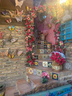 the stairs are decorated with flowers and butterflies