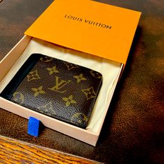 I’m Selling My Used Louis Vuitton Wallet, It Is Used And Shows Some Card Wear And A Slight Crack On The Fold In The Inside. It Is 100% Authentic, I Have All Of The Receipts From Store Of Purchase As Well As Folders, Box And Dust Cover. Please Send Me A Reasonable Offer Or Message Me With Any Questions. Thank You! Used Louis Vuitton, Louis Vuitton Brown, Louis Vuitton Wallet, Louis Vuitton Accessories, The Fold, Some Cards, Bifold Wallet, Dust Cover, Accessories Men