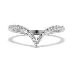 a white gold ring with diamonds on the side and an arrow shaped band around it