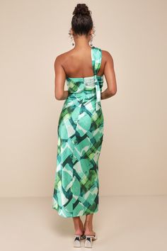 Catch everyone's attention with a memorable look like the Lulus Iconic Presence Green Abstract Satin One-Shoulder Midi Dress! Sleek woven satin, with a green abstract print throughout, shapes a single, sash strap that crosses the one-shoulder neckline and secures atop the open-back design with a knotted detail at the side. Fitted bodice features an asymmetrical, overlay with gathering at the sides. The figure-skimming silhouette continues into a slip-style skirt that finishes at a midi hem with Green One Shoulder Dress With Asymmetrical Neckline For Evening, Green One Shoulder Evening Dress For Summer, Green One Shoulder Dress For Summer Evenings, Green Satin One Shoulder Party Dress, Green Silk Dress For Gala, Elegant Green One Shoulder Summer Dress, Green Off-shoulder Dress For Gala, Chic Green One Shoulder Dress For Formal Occasions, Chic Green Satin One Shoulder Dress