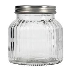 an empty glass jar with metal lid