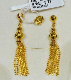 Dangling tassel earrings 916 Gold Gold purity: 916 gold / solid 22k gold Hallmark: 916 stamped Weight : 5.70 grams Colour: yellow gold Design : solid beautiful tassels dangling earrings with push back posts BN Authentic 916 gold  FAQs Q: Is it real gold? A: yes it's real authentic genuine 916 gold Q: can pawn? A: yes it's pawnable ⭐️GoForGold⭐️ 22k Gold Dangle Jewelry For Anniversary, Yellow Gold Earrings For Anniversary And Festivals, Yellow Gold Earrings For Anniversary And Festive Occasions, Yellow Gold Dangle Bridal Earrings With Latkans, Festive Yellow Gold Anniversary Earrings, Gold Plated Hallmarked Dangle Earrings, Gold Plated Earrings With Latkans For Anniversary, Gold Plated Latkans Earrings For Anniversary, Yellow Gold Jewelry With Latkans For Anniversary