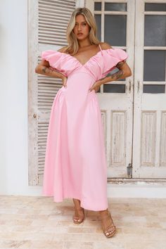 Length from shoulder to hem of size S: 131cm. Chest 43cm, Waist 33cm, across front only of size S. Midi dress. Semi-lined. Model is a standard XS and is wearing size XS. True to size. Non-stretch. Puff sleeves, elastic. Flowy skirt. Zipper. Cold hand wash only. Cotton/Rayon. Dreamy and gorgeous. The Fun Loving Off Shoulder Midi Dress features puff sleeves and a flowy skirt. Style with heels and curls for a 'fit you'll get compliments on. Off Shoulder Midi Dress, Midi Dress Pink, Event Dress, Skirt Zipper, Long Bodycon Dress, Shower Dresses, Jumpsuits And Romper, Skirt Style, Halter Maxi Dresses