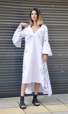 "Dress For Women, White Dress, Japanese Clothing Beautiful, simple long dress, shirt. White cotton Kaftan with beautiful black drawings. Extravagant sleeves. Has a pockets. Suitable for party, wedding, for everyday life and rest. Very elegant and loose. Very suitable for pregnancy. The dress does not appear. Quality cotton fabric. Great summer dress. Model wearing size XS. Maxi sizes available. The style was originally designed and professionally constructed by me. Each item of my shop is specia White V-neck Shirt Dress With Relaxed Fit, White Tunic Shirt Dress For Spring, White V-neck Relaxed Fit Shirt Dress, White Relaxed Fit V-neck Shirt Dress, White Relaxed Fit Shirt Dress With V-neck, White Tunic Style Relaxed Fit Maxi Dress, White Cotton V-neck Shirt Dress, White Relaxed Fit Tunic Maxi Dress, White Relaxed Fit Maxi Dress With Long Sleeves