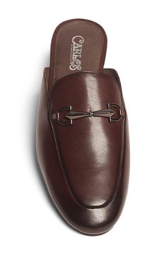 A leather mule topped with a shining metal bit is a timeless silhouette that elevates any refined ensemble with polished detail. Leather upper and lining/rubber sole Imported Luxury Calf Leather Slip-on Men's Shoes, Calf Leather Slip-on Mules With Textured Sole, Brown Leather Sole Slip-on Mules, Brown Monk Strap Slip-on Shoes In Calf Leather, Brown Slip-on Mules With Stitched Sole, Leather Mules, Mule, Size 13, Nordstrom Rack