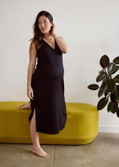 The most easy-to-wear dress ever. You'll love the smooth textured knit, paired with the center-front seam for an elevated everyday look. Add in a flattering deep V and just-right hem slits, and it's made for standing out whether you’re pregnant, postpartum or living the mom life. 87% polyester / 11% rayon / 2% spandex Hand wash cold with like colors. Do not bleach. Lay flat to dry. Iron low heat. Machine wash cold with like colors. Do not bleach. Tumble dry low. Iron low heat. A Now + Forever™ f Stretch V-neck Midi Dress For Daywear, Fitted V-neck Maxi Dress For Loungewear, Stretch V-neck Midi Dress With Side Slits, Stretch Midi Dress With Side Slits And V-neck, Stretch Midi Dress V-neck For Daywear, Casual V-neck Lounging Dress, Stretch V-neck Loungewear Dress, Chic V-neck Maxi Dress For Loungewear, Casual V-neck Midi Dress With Flattering Silhouette