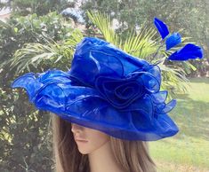 This beautiful hat is lightweight and would be perfect for horse races, tea parties, bridal showers, church or any special event.  Can be made in several color options. Royal Blue Fitted Hat For Kentucky Derby, Royal Blue Wide Brim Hat For Spring, Royal Blue Hat With Curved Brim For Kentucky Derby, Fitted Blue Hat For Garden Party, Blue Cloche Hat For Spring, Fitted Royal Blue Hat For Summer, Royal Blue Evening Hat For Summer, Royal Blue Hat For Kentucky Derby Party, Royal Blue Hat For Kentucky Derby