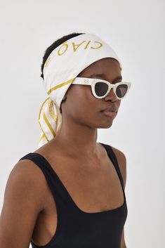 Look no further for the ultimate summer accessory that will have you feeling like you're in the Italian Rivera. Silky smooth feel scarf. Screen printed design. Invisible finish. Featuring golden yellow framing finish with a gorgeous print in the center. Compliments and elevates any summer outfit. Style it with your favorite swim and resort pieces to perfect the Italian summer look. Color: Golden Yellow Monogram Fabric composition: 100% Polyester Scarf size: 80 cm X 80 cm Care: Hand wash only in Elegant Summer Beach Scarves, Chic Summer Beach Headscarf, Summer Vacation Bandana, Chic Summer Beach Silk Scarf, Chic Summer Silk Scarf For Beach, Chic Silk Scarf For Summer Beach, White Spring Scarves For Vacation, White Scarf For Spring Vacation, White Scarves For Spring Vacation