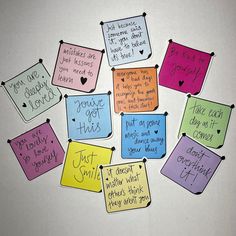 several colorful sticky notes with writing on them