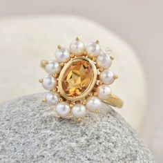 Natural Madeira Citrine Pearl ring > Natural gem stone gift Ring wedding gift ring  > Metal Type:  Sterling Silver > Metal Steam : 925 >  GEM STONE TYPE . Madeira Citrine  . oval  6x8 . 1 pcs  .Cubic Zirconia :  marquise /2.5x5 -4 pcs  . Cubic Zirconia: round 2 mm 6 pcs >Plating  Availability:-  White Rhodium plating/Yellow Gold Plating/Rose Gold Plating. >Product Category:-- Wedding Ring, Engagement Ring, Promise Ring, Anniversary Gift FEATURE >Purity Stamp *Safe  Shipping  of Your Jeweler Orde Classic Gemstone Cluster Ring As Gift, Oval Pearl Gemstone Ring For Anniversary, Oval Citrine Birthstone Ring For Anniversary, Fine Jewelry Pearl Ring With Birthstone, Fine Jewelry Pearl Ring With Prong Setting As Gift, Wedding Jewelry With Citrine Birthstone, Citrine Birthstone Wedding Jewelry, Citrine Birthstone Jewelry For Wedding, Wedding Citrine Birthstone Jewelry