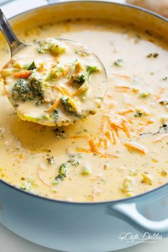 a ladle full of broccoli cheese soup