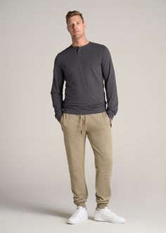 About Our Pima Stretch Knit Henley Shirt for Tall Men Our men's tall henley shirts take all of the classic features of a henley and recreate them with height in mind. This tall long sleeve shirt is designed specifically for men from 6'3 to 7’1. It has extra long sleeves, a slim fit and a hemline that hits your hip — no bagging or gapping happening here. We made this shirt for tall men with a comfortable cotton blend that has added stretch for every day comfort. The fabric has been pre-washed and Casual Relaxed Fit Henley For Gatherings, Casual Henley With Relaxed Fit For Layering, Casual Henley Neckline Tops For Gatherings, Casual Crew Neck Henley For Loungewear, Casual Relaxed Fit Henley For Loungewear, Casual Henley Neckline Tops For Loungewear, Tall Men Outfits, Tall Men, Mens Henley