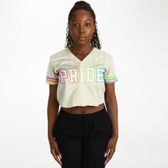 Pride Cropped Jersey | Love is Love Cropped Jersey Show up in style with this cropped baseball jersey. This top is a must-have for any modern fashionista. The chic design is casual yet trendy, making it a perfect addition to your wardrobe essentials. Designed with versatility in mind, the jersey’s lightweight moisture-wicking fabric will keep you cool during game days and hot summer nights out with friends. Plus, it has a button front closure that makes it very easy to wear. • 100% polyester • S Sporty Crop Top For College In Spring, Sporty White Cropped Shirt For Spring, Varsity Style Letter Print Tops For Spring, Varsity Tops For Spring Streetwear, Sporty Tops With Graphic Print And Baseball Collar, Varsity Tops For College Spring Season, Varsity Tops For College In Spring, Spring Varsity Tops For College, Sporty Cropped T-shirt For Spring Streetwear