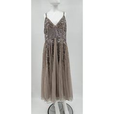 100% Polyester. Made In India. Stunning Festive Embellished Midi Evening Dress, Silver Sequin Dress For Celebration, Silver Sequin Celebration Dress, Floor-length Dress For Party Season, Holiday Sequin Dress For Celebration, Festive Champagne Sequin Dress, Midi Length Festive Dresses For Party Season, Festive Midi Length Dress For Party Season, Festive Midi Dress For Party Season