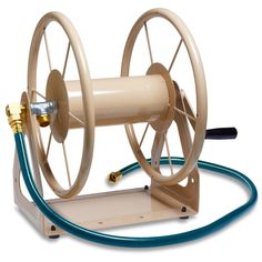 a spooling machine with hoses attached to it