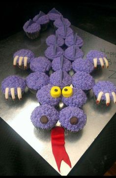 an image of a purple cake that looks like a monster