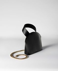 Detailed Product Description: Maeyja Design Women's Bag CU-15.5 Model - Luxurious Black Calfskin Shoulder Bag Introducing the Maeyja Design CU-15.5 model, a sophisticated and stylish addition to your collection. This black calfskin shoulder bag combines timeless elegance with modern functionality, making it perfect for the fashion-forward woman. Crafted from 100% premium calfskin, the bag features a luxurious texture that enhances its refined appearance. Key Features: Color & Material: The rich Minimalist Bag, Style Savvy, Color Complement, Bag Luxury, Personalize Bag, Look Chic, Gold Details, Magnetic Closure, Chain Strap