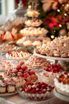 a table topped with lots of desserts covered in frosting