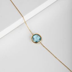 "Blue Topaz Bracelet, December Birthstone, Gold Gemstone Bracelet, 14K Bracelet, Citrine Gold Bracelet, Birthstone Bracelet, Bridal Bracelet, 14K Chain Bracelet, Bridal Jewelry Gemstone bracelet on a dainty 14K solid gold chain. 100% handcrafted with love! ● Metal: 14K solid gold, 14K white gold or 14K rose gold ● Gemstone: Blue Topaz, Chalcedony, Labradorite, Black Onyx, Green Amethyst, Purple Amethyst, Citrine, Lemon Quartz, Smoky Quartz, Chrysoprase, Moonstone, Orange Moonstone ● Stone Diamet Gold Blue Topaz Bracelet, Yellow Gold Bracelets With Blue Topaz For Gift, Yellow Gold Bracelet With Blue Topaz For Gifts, Yellow Gold Blue Topaz Bracelets Gift, Fine Jewelry Blue Topaz Round Bracelets, Gold Gemstone Bracelet For Birthday, Blue Gold Bracelet With 17 Jewels For Gift, Blue Topaz Gemstone Bracelet As A Gift, Blue Topaz Gemstone Bracelet For Gift